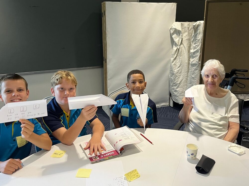 Port Douglas State School, Year 5 and 6 students with resident from Kubirri Aged Care Centre