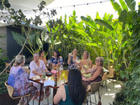 Group of friends enjoying a drink at Hughies